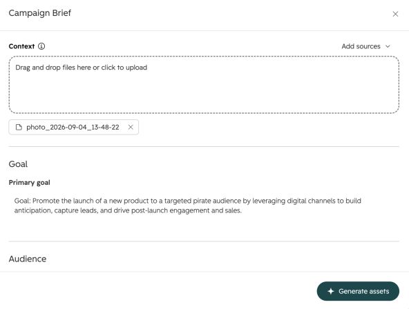 HubSpot Marketing Studio campaign brief with context, goal, audience, and Generate assets control